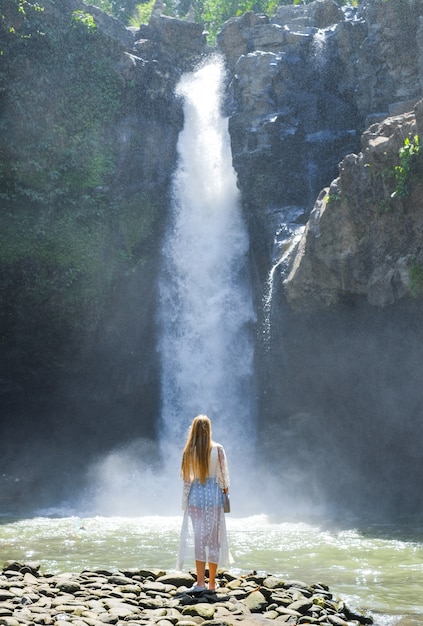 Woman on a waterfall