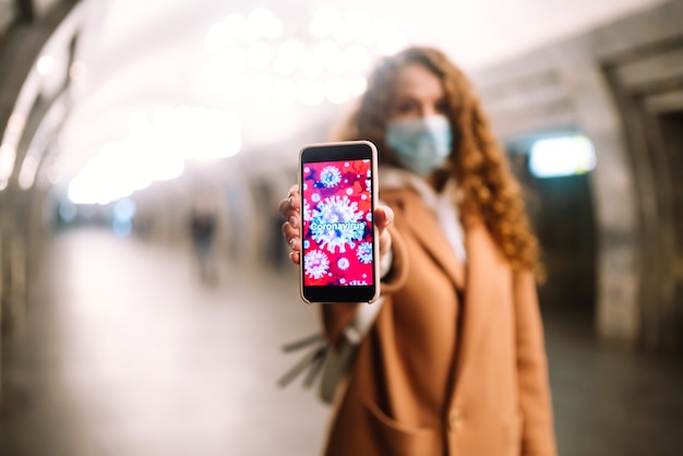 Woman, wear face mask, protect from infection of virus, pandemic, outbreak and epidemic of disease in quarantine city.