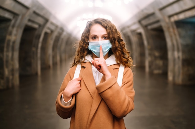 Woman, wear face mask, protect from infection of virus, pandemic, outbreak and epidemic of disease in quarantine city.