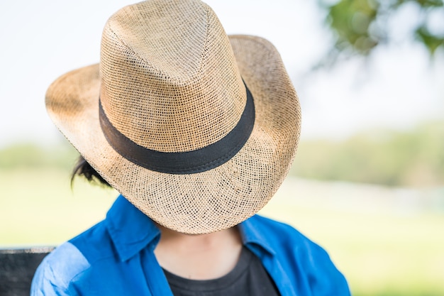 Premium Photo Woman wear hat sit sleep in countryside