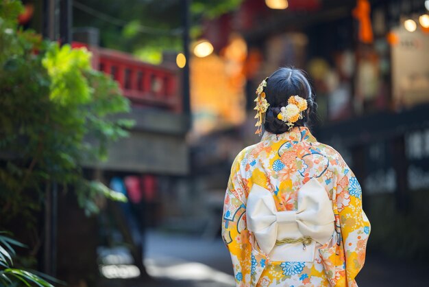 Photo woman wear kimono in the japanese village