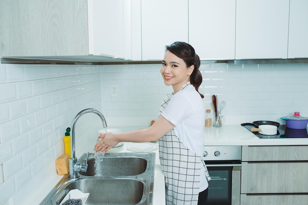 Woman wearing an apron kitchen cooking