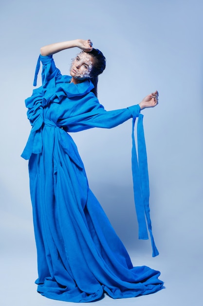 Woman wearing beautiful blue dress