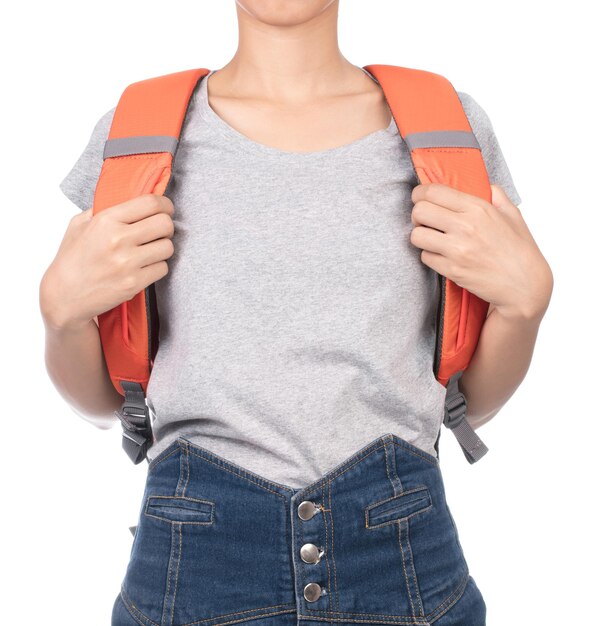 woman wearing blank gray t-shirt, jeans and backpack isolated from white background.