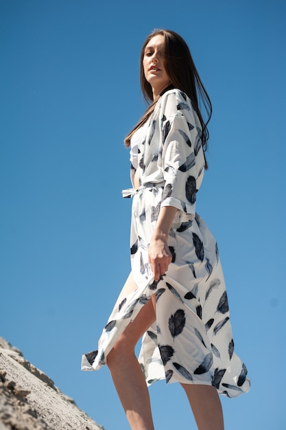 Woman wearing fashion tunic on the beach