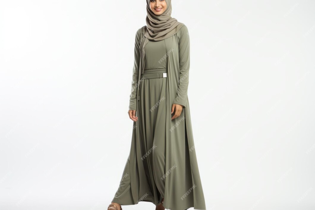 Premium Photo | A woman wearing a green abaya and a hijab