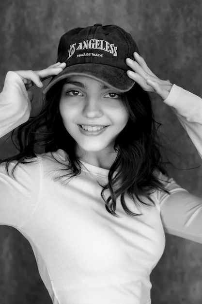 a woman wearing a hat that says quot the word quot on it