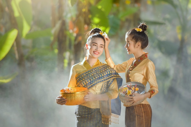 Woman wearing laos traditional dress costume, vintage style, Laos culture, Laos