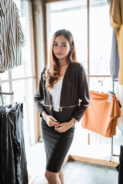 Woman wearing nice clothes posing