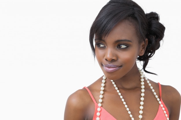 Woman wearing a pearl necklace