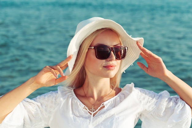 Woman wearing a straw hat