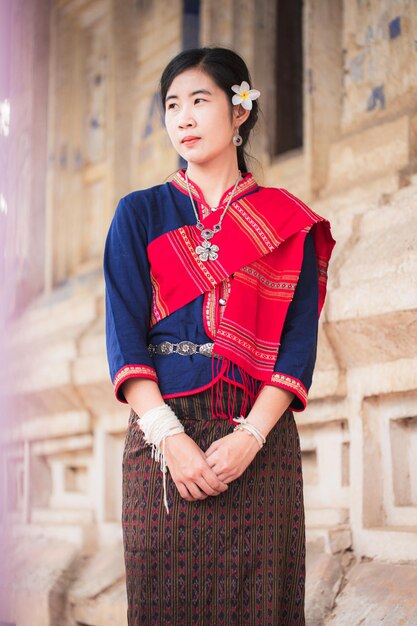 woman wearing thai dressWomen in thai dress at the old temple