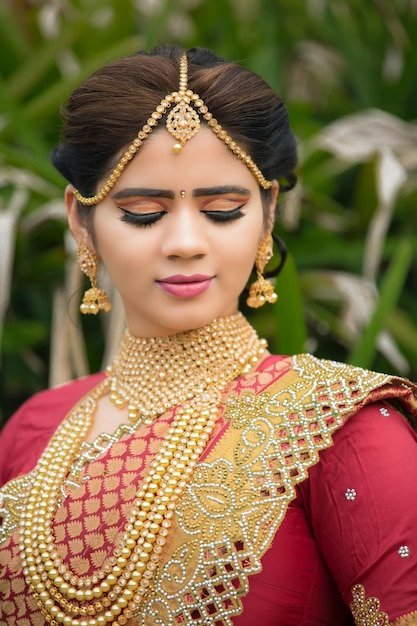 A woman wearing a traditional indian bri