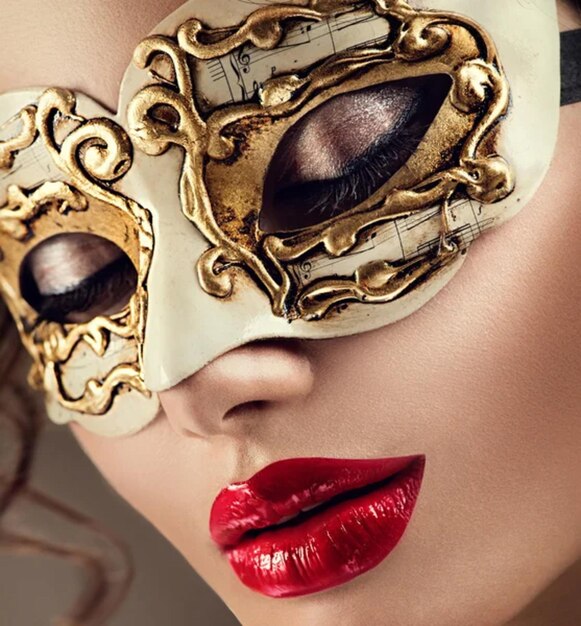 Woman wearing venetian carnival mask