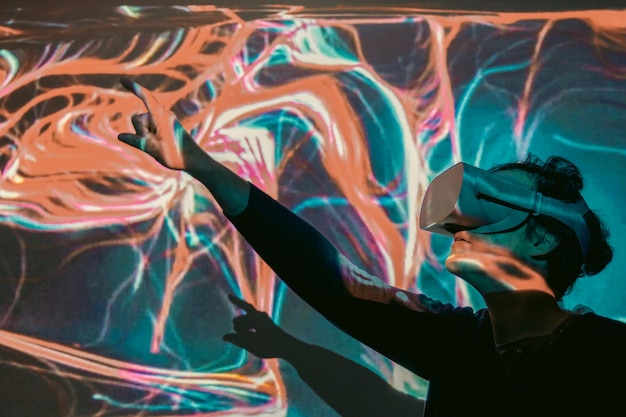 A woman wearing virtual reality glasses cyber space