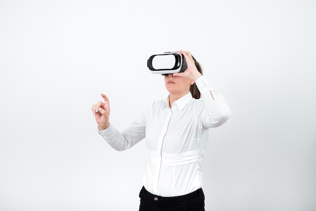 Woman wearing vr glasses and pointing on important messages with one finger businesswoman having