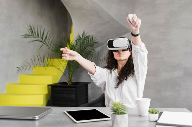 Woman wearing a vr set and remote