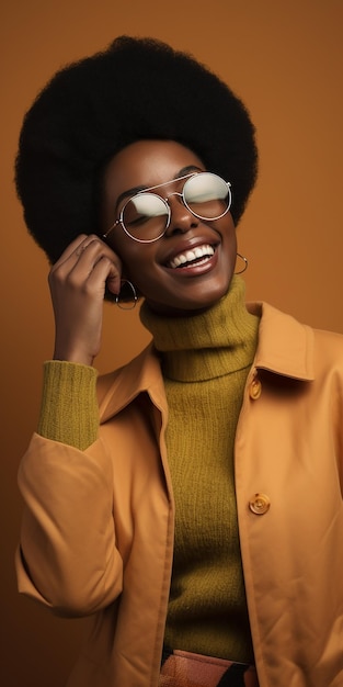 A woman wearing a yellow turtleneck and glasses talks on a phone.