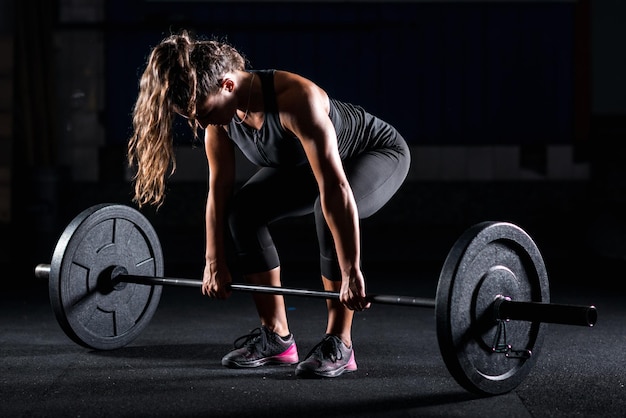 Woman weightlifting on training