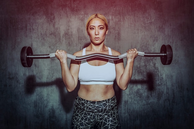 Woman weightlifting with a barbell