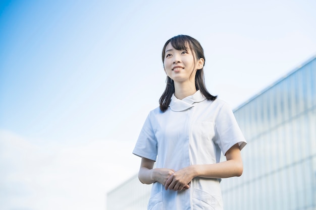Photo woman in white coats medical image of nurses dental hygienists salons in general etc