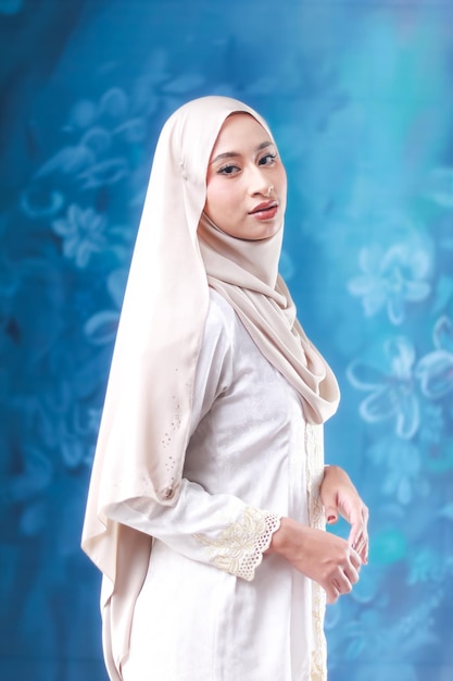 A woman in a white hijab and a white hijab