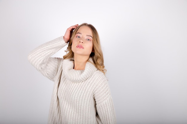 Woman on white sweater on white