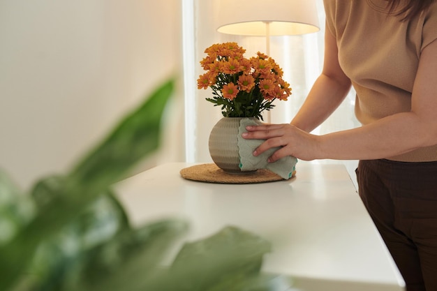 Woman Wiping Vase