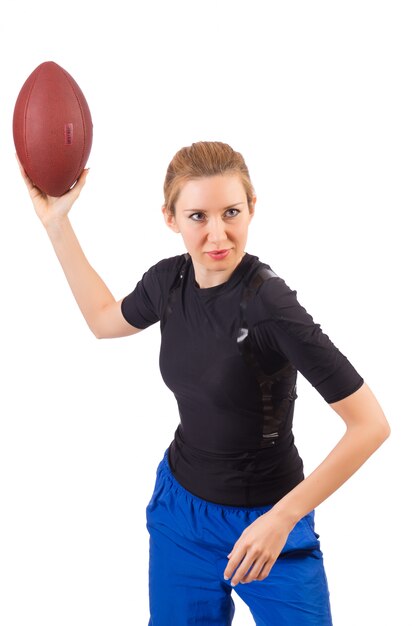Woman with american football isolated on white
