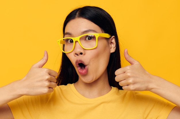 Woman with asian appearance hands gesture emotions cropped view isolated background unaltered