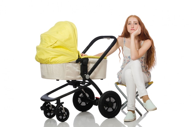 Woman with baby and pram isolated on white