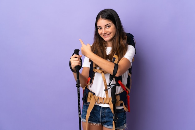 Woman with a backpack in studio