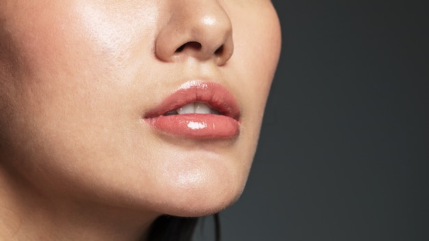 Woman with beautiful red lips close-up shot