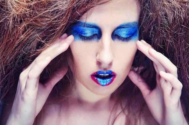 Woman with blue visage