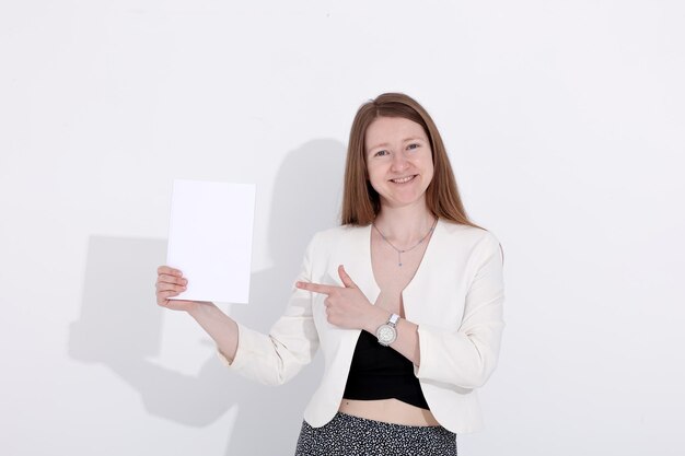 woman with a book magazine and laptop on a white background student business mockup