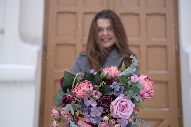 woman with a bouquet of flowers