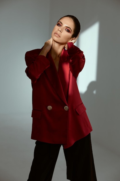 Woman with bright makeup glamor red jacket decoration fashion High quality photo