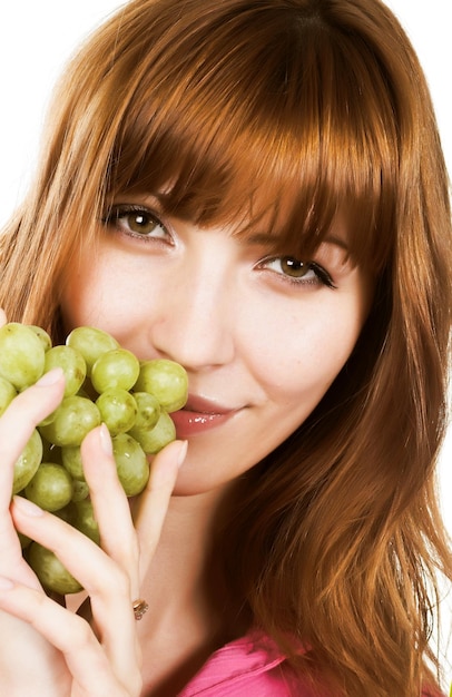 Woman with bunch of grape