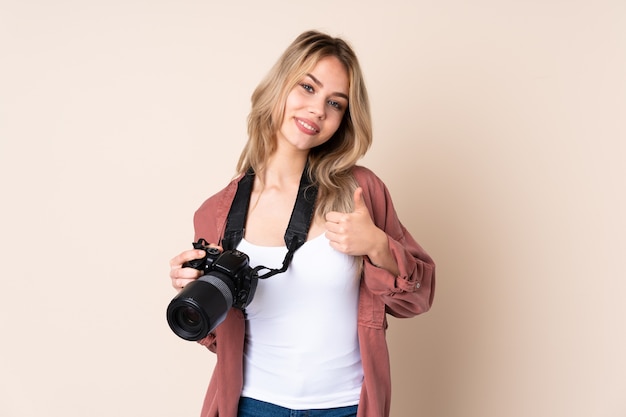 Woman with camera in studio