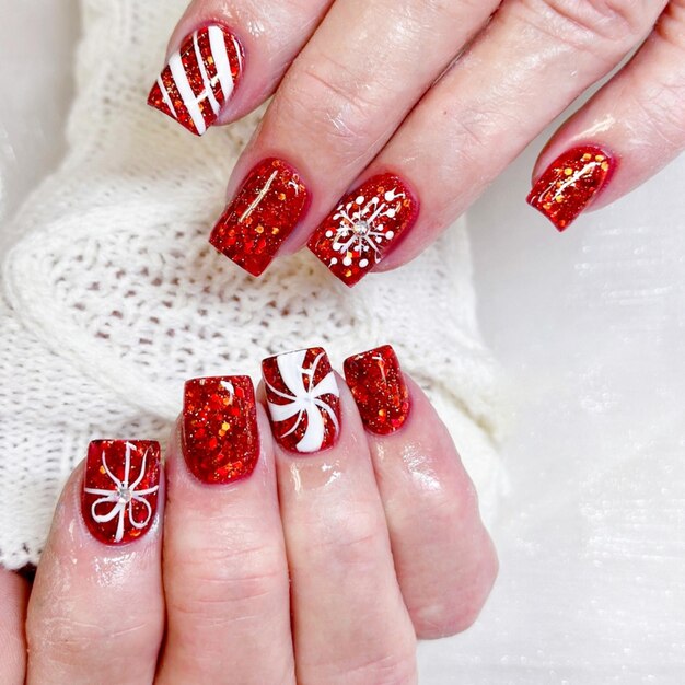 Woman with Christmas Red nails design Manicure Nail salon Christmas Nails Nail designs