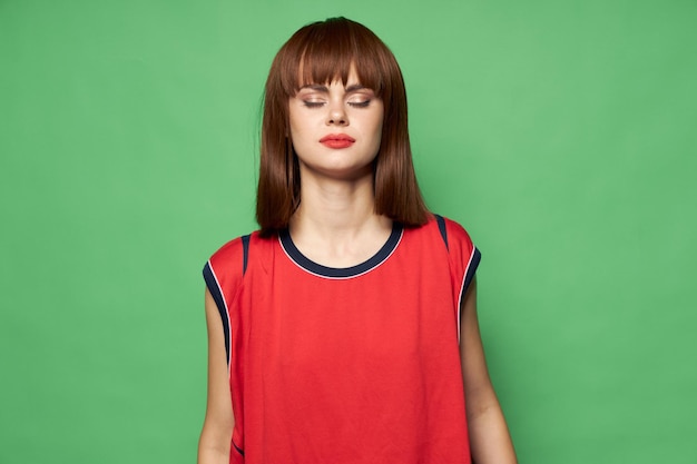 Woman with closed eyes red hair model