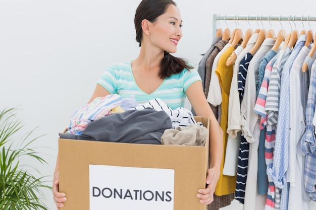 Woman with clothes donation