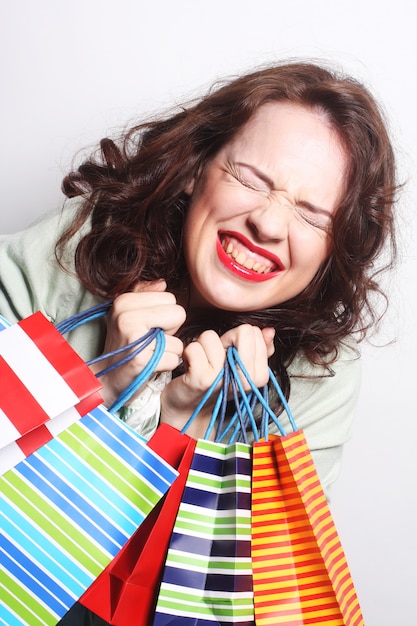 woman with colored shopping bags