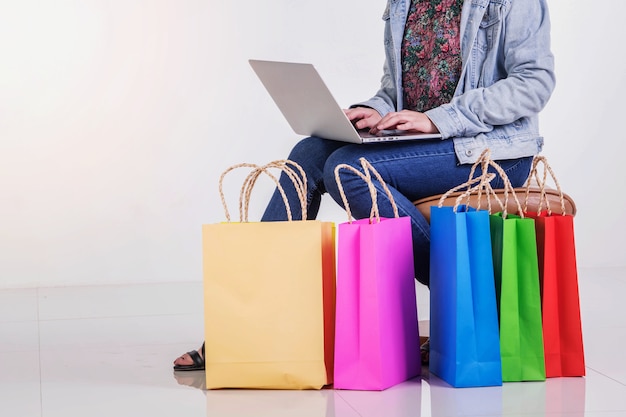woman with colorful shopping bags