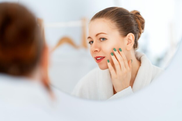 woman with cream for her face