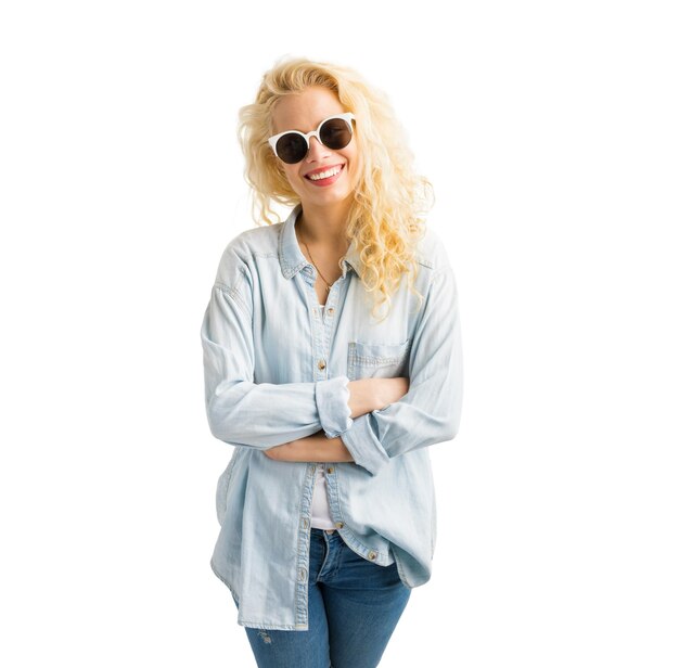 Woman with crossed hands and sun glasses on white background