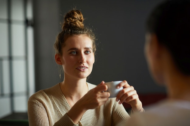 Woman with cup of tea