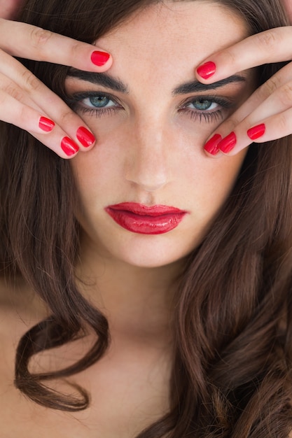 Woman with curly hair and red lips