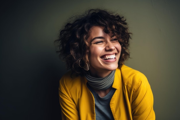 A woman with curly hair smiles and smiles.