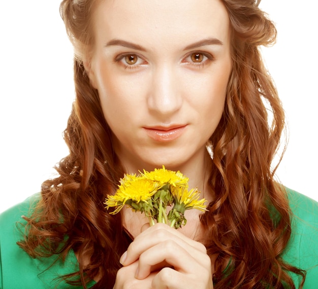 Woman with dandelion bouquet